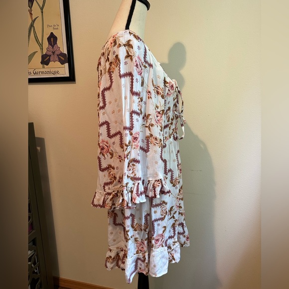 ASOS Design 70s Boho Pink and White Floral Bell Sleeve Ruffle Mini Dress - Picture 8 of 9